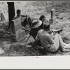 Friends of the deceased's family, an annual memorial meeting in the family cemetery. In the mountains near Jackson, Kentucky. See general caption no. 1