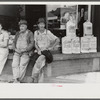 Farmers hanging in front of stores on Saturday, Jackson, Kentucky