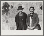 Mr. and Mrs. S. Castle or Mr. and Mrs. William S. Allen standing before their new storage house. Southern Appalachian Project, near Barbourville, Knox County, Kentucky