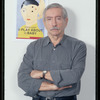 Edward Albee with the poster for The Play About the Baby