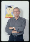 Edward Albee with the poster for The Play About the Baby