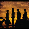 The cast in silhouette in Talk