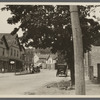 View of Woodbine Street. Corner of Main Street. Drugstore on left. Northport, Huntington
