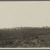 View looking west from west branch of shore road. Showing hay field, houses and tower in the distance. Water Mill, Southampton