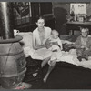 Wife and two children of unemployed mine worker. She has TB and syphilis. They are one of five families living in old abandoned company store in abandoned mining community of Marine, West Virginia