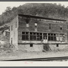 Old company store in abandoned coal mining town. Marine, West Virginia. The store is occupied by three families