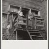 Wife of unemployed miner with her mother and two children. Marine, West Virginia