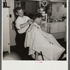 The barber is also the Justice of Peace in mining town of Osage, West Virginia
