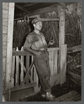 Coal miner (Italian) resting and smoking his pipe after coming home from work. "The Patch," Chaplin, West Virginia