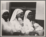 Betty Shabazz holding Qubilah, circa 1960