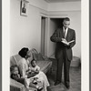 Malcolm X at home with wife Betty and daughters Attallah and Quibilah