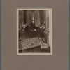 Ronald Firbank in a furnished interior