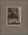 Ronald Firbank in a furnished interior