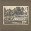 Ronald Firbank on a houseboat in Egypt, leaning on bannister of staircase
