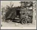 Tom Tom Herb Tonic truck in transient labor cabin and trailer camp. Belle Glade, Florida