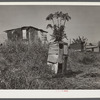 Migrant vegetable pickers and packinghouse workers living quarters off main highway near Lake Harbor, Florida