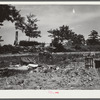 The remaining household goods after fire destroyed the home of a farm wagehand (day laborer, seventy-five cents per day) on a three acre piece of land owned by his mother. Greene County, Georgia