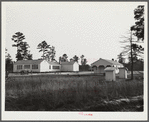 Community and school building, shop and sanitary units, rearview. Prairie Farms, Alabama