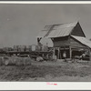 Barrels of pine sap brought to turpentine still. Iron City, Alabama