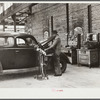 Testing motors of car in FSA (Farm Security Administration) warehouse depot. Atlanta, Georgia