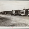 Migratory laborers' camp. Single-room cabin costs two dollars and fifty cents, double room four dollars per week. Water hauled, usually priced at fifty-five cents for fifty-five gallon tank. Toilet for about 150 people. Near Belle Glade, Florida