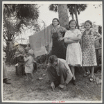 Migrant laborer's family, packing house workers. Canal Point, Florida