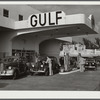 Even the gas stations are on an elaborate scale, often modern in design, resembling hotels. Miami Beach, Florida