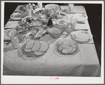 Balanced diet at Helms family supper: roast beef (home canned) turnip greens, potato salad, stuffed eggs, lima beans, rice, pear pickles, biscuits, cornbread, butter, milk, peaches, cake. Coffee County, Alabama