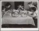 Helms family at dinner which consists of roast beef (home canned), turnip greens, potatoes, biscuits, corn bread, butter, milk, peaches, and cake. Coffee County, Alabama