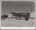 Florence Wright (in white slacks), recreation supervisor, directing games during outdoor period. Gee's Bend, Alabama