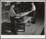 T.A. Davis and Buford Brown at bench saw in shop class. Ashwood Plantations, South Carolina