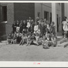 Prize-winning group of students on steps of auditorium after May Day-Health Day program at Ashwood Plantations, South Carolina