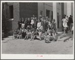 Prize-winning group of students on steps of auditorium after May Day-Health Day program at Ashwood Plantations, South Carolina