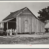 Mrs. Melody Tillery (RR-Rural Rehabilitation family) with her children on porch of their home. Pike County, Alabama