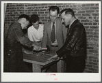 Vocational teacher and school principal help the boys make a large table in shop at Goodman School. Coffee County, Alabama