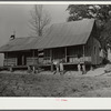 House of J.D. Smith R.R. first year, mother has been dead 8 years. 13 year old girl, Gladys, cares for 2 room house and 6 in family. Miss Christian, home supervisor, is bringing her sheeting, water must be carried from neighbors. Coffee County, Alabama