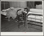Bedroom (and kitchen and living room) of former RR (Rural Rehabilitation) family (see 51435-D). Coffee County, Alabama