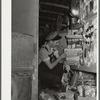 Inside of rolling store with tank of kerosene on back (at left). Coffee County, Alabama. Average daily sale is sixty dollars and they take in lots of produce