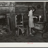 Gladys Smith, thirteen year old girl, who cooks and cares for a family of six. RR (Rural Rehabilitation) first year (see 51402-D). Coffee County, Alabama