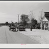 Combination filling station, garage, blacksmith shop, grocery store. Frank Petty, owner of the wagon, has just had his mule shod, his corn ground, purchases some kerosene and is returning home. R.F.D. Danville, Virginia, Pittsylvania County