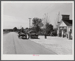 Combination filling station, garage, blacksmith shop, grocery store. Frank Petty, owner of the wagon, has just had his mule shod, his corn ground, purchases some kerosene and is returning home. R.F.D. Danville, Virginia, Pittsylvania County
