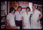 Group portrait of four workers, Symposium Restaurant