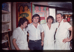 Group portrait of four workers, Symposium Restaurant