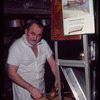 Restaurant worker cutting meat, Symposium Restaurant