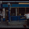 Storefront, Grecian Souvlaki, with man and dachshund