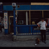 Storefront, Grecian Souvlaki, with man and dachshund