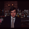 Man seated at bar, 1057 Restaurant