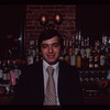 Man seated at bar, 1057 Restaurant