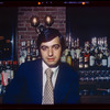 Man seated at bar, 1057 Restaurant