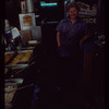 Restaurant worker in blue shirt at serving station, Nea Hellas
